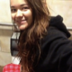 A young-looking girl records herself taking a piss and a shit while sitting on a toilet in a public restroom stall. Subtle pooping sounds can be heard. Over 2 minutes.
